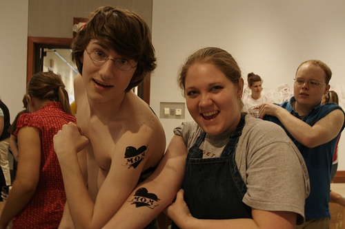 What we do for our audiences. Joel and Jess show off temporary tattoos.